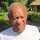 Bill Cosby speaks to reporters outside of his home on June 30, 2021.